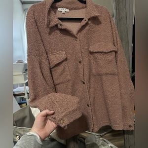 Super cute shirt. Can be worn buttoned or unbuttoned.